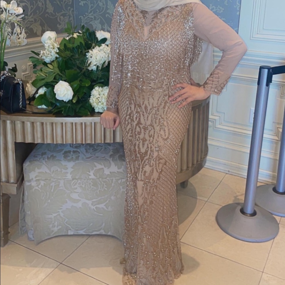 Gold fringe long sleeve evening gown